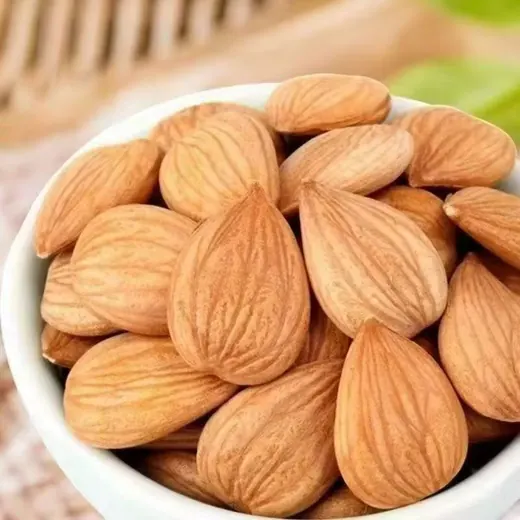 Whole almonds in a white bowl